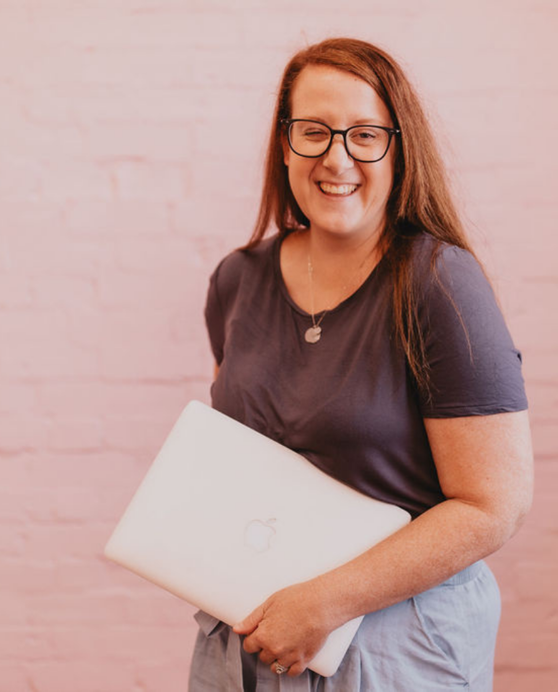 I'm Carly, a digital marketing strategist who will love your business as much as you do